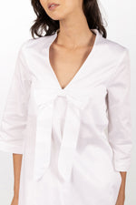 White cotton A-line dress with petticoat