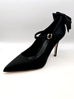 Black high-heeled pumps with strap