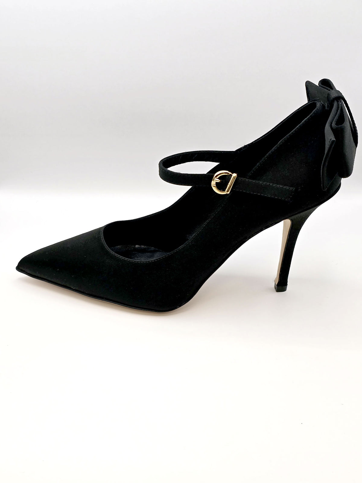 Black high-heeled pumps with strap