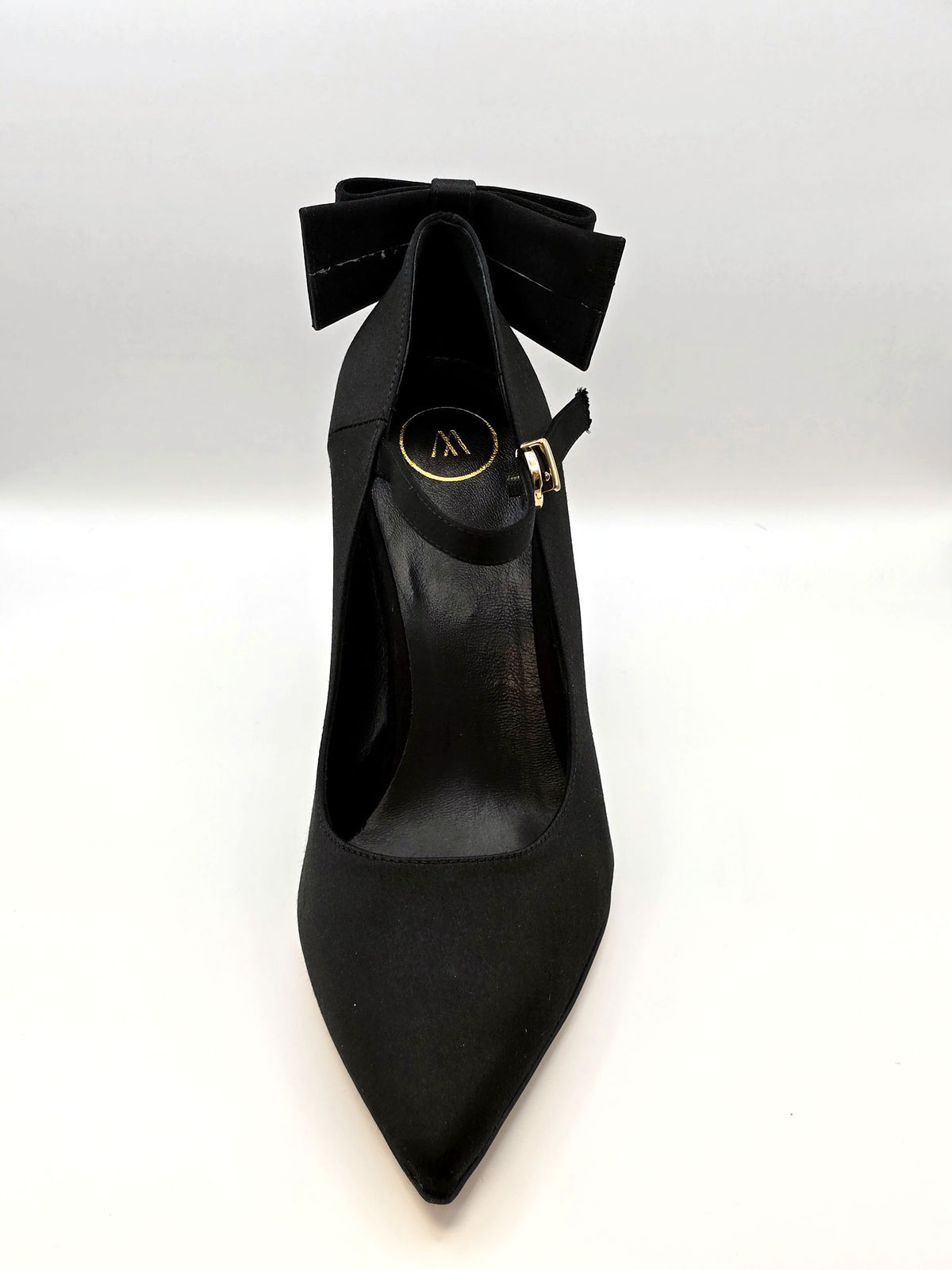 Black high-heeled pumps with strap