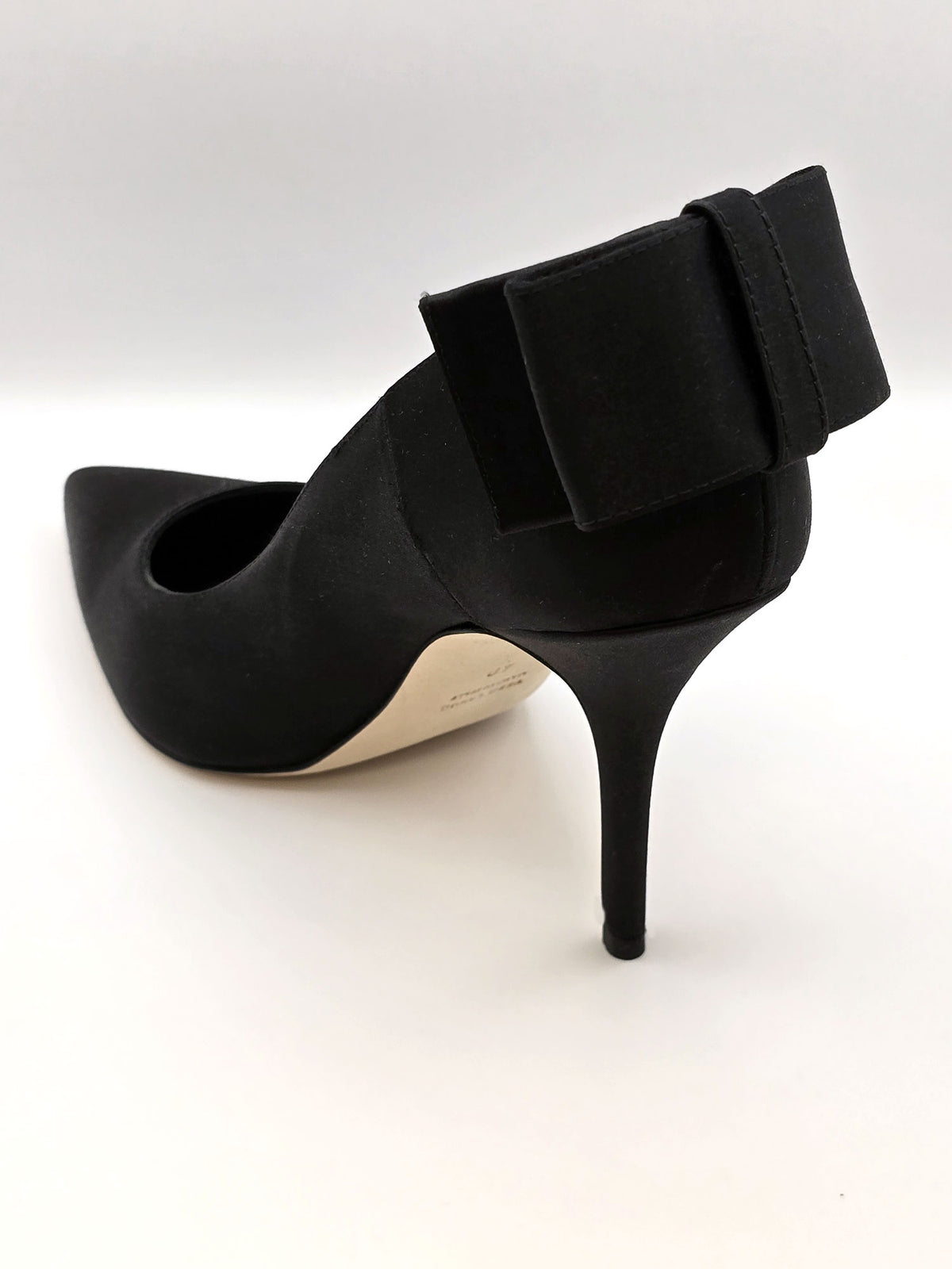 Black high-heeled pumps