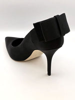 Zwarte pumps met hoge hakken