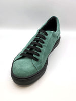 Sport-shoes in leather and green suede